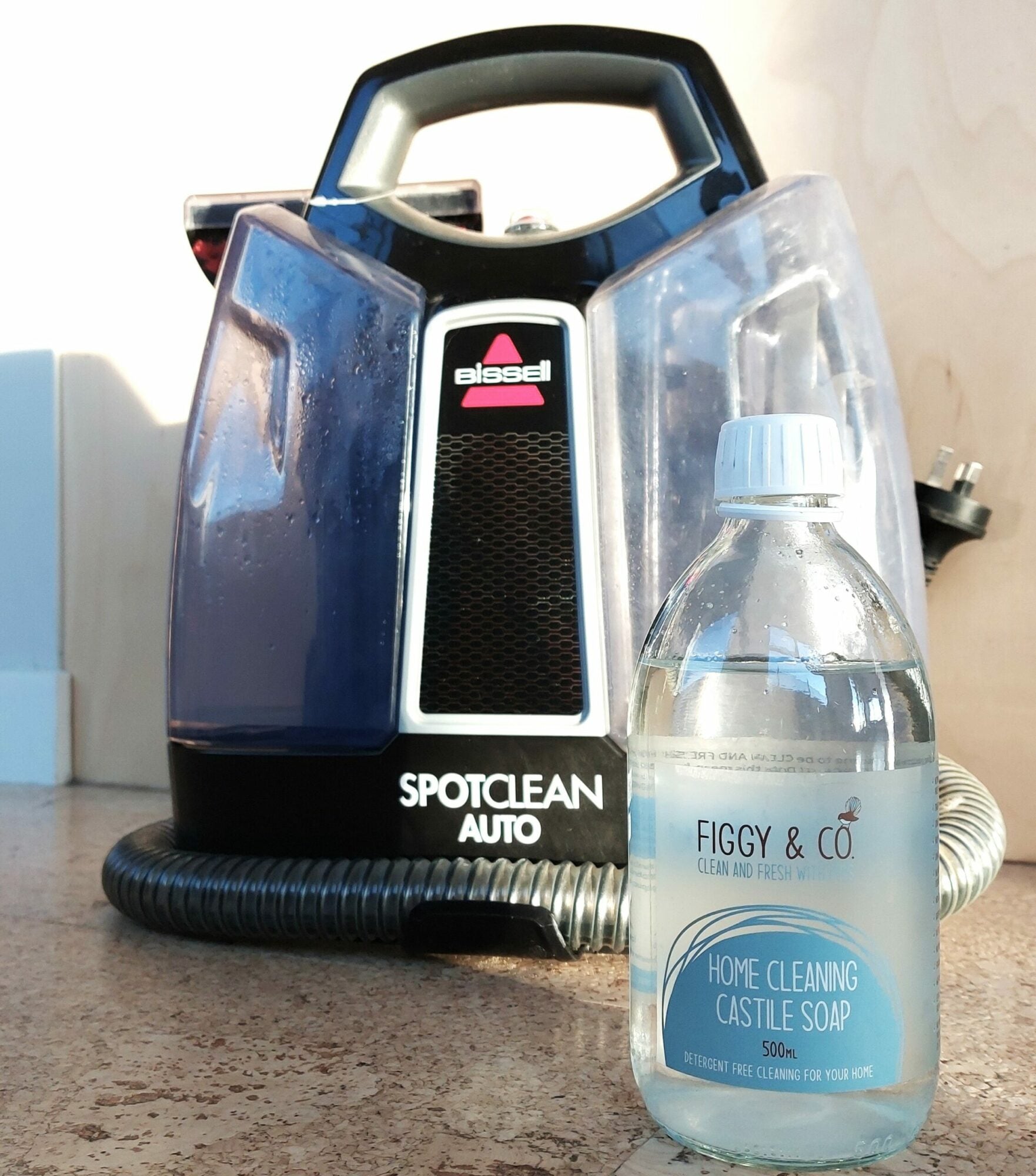 A Bissell spot cleaner and castile soap is a great non-toxic cleaning combination for busy families with kids and pets.