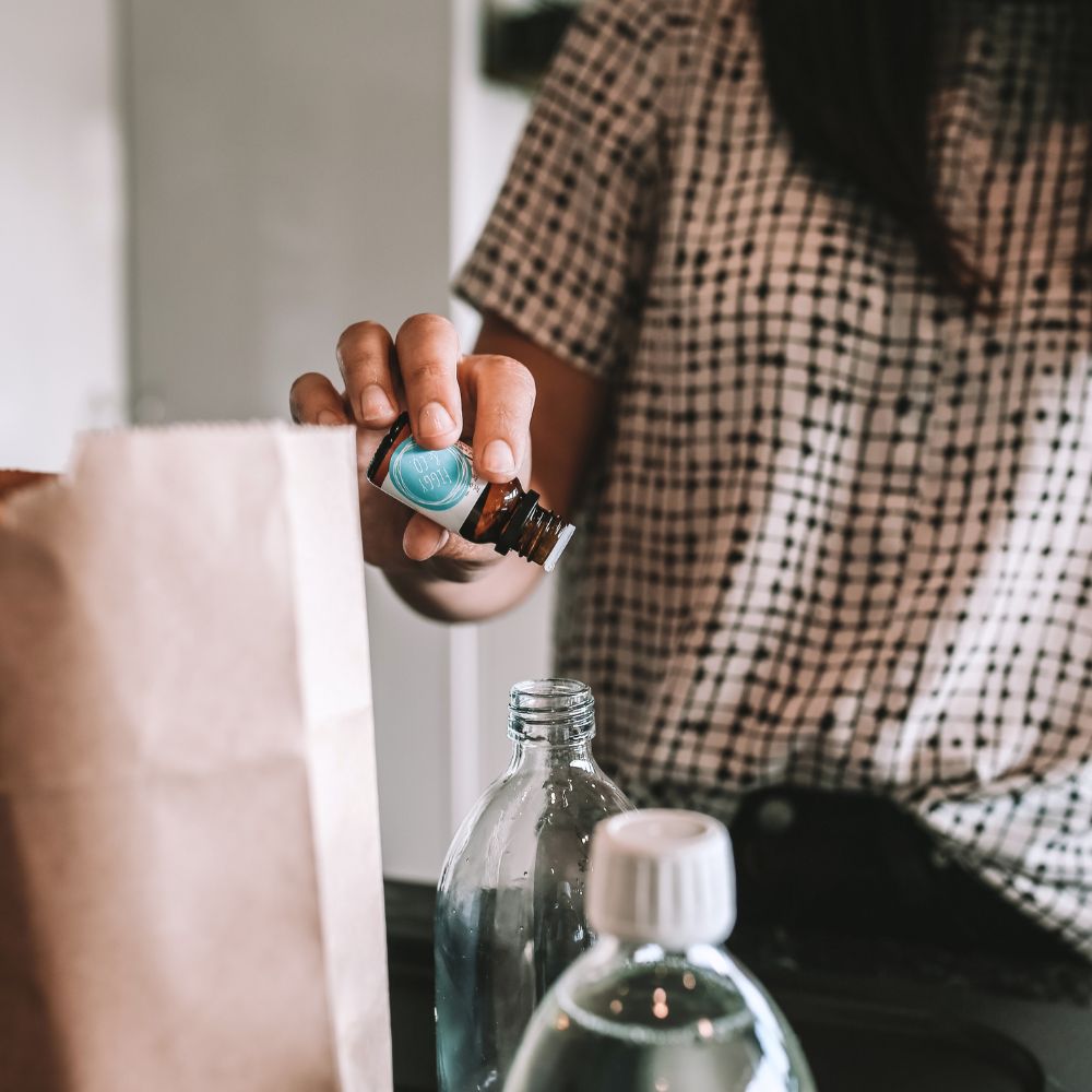 DIY cleaning product making kit with vinegar, baking soda, soap, washing soda and more